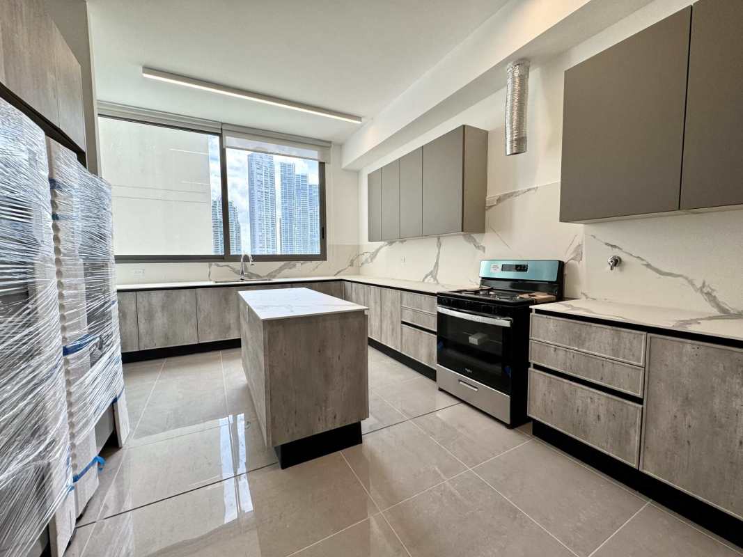 Large balcony with glass railings overlooking Pacific Ocean from PH Sea Point Punta Paitilla luxury apartment