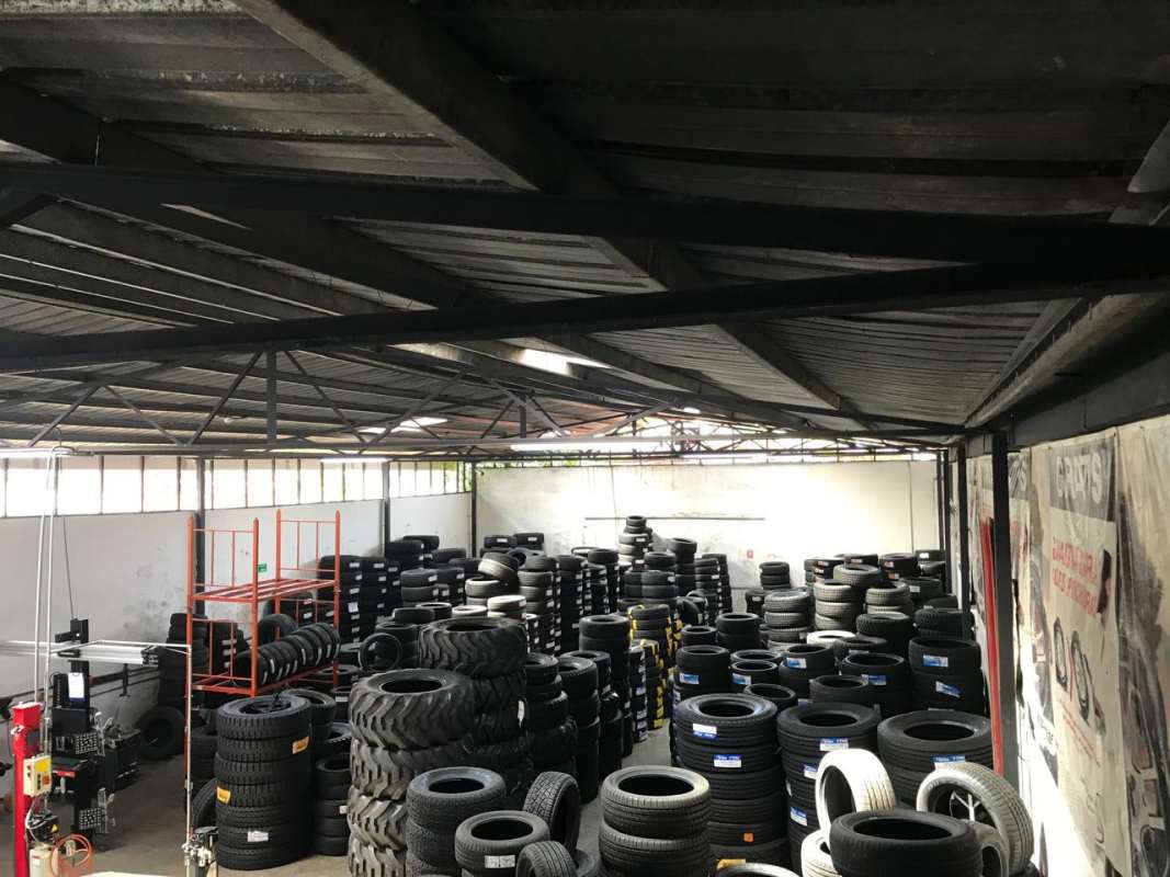 Interior workshop garage with storage racks and industrial lighting in Costa del Este Panama