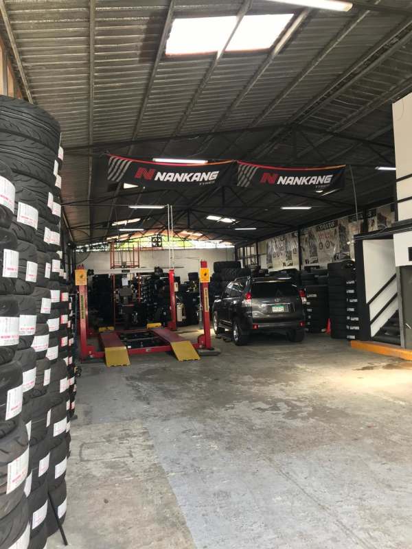 Car repair and tire shop interior view in warehouse Costa del Este Panama