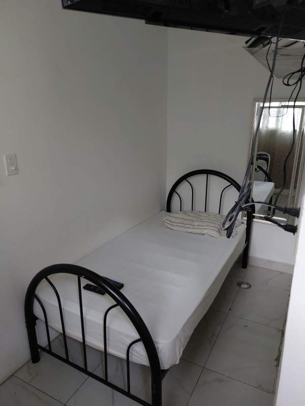 Contemporary living room with large window and stylish furnishings in Villa Lucre duplex house for sale