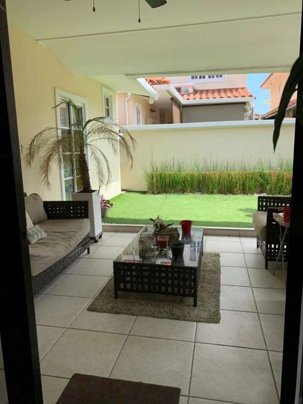 Covered garden patio perfect for BBQ at Villa Valencia Costa Sur townhouse Panama