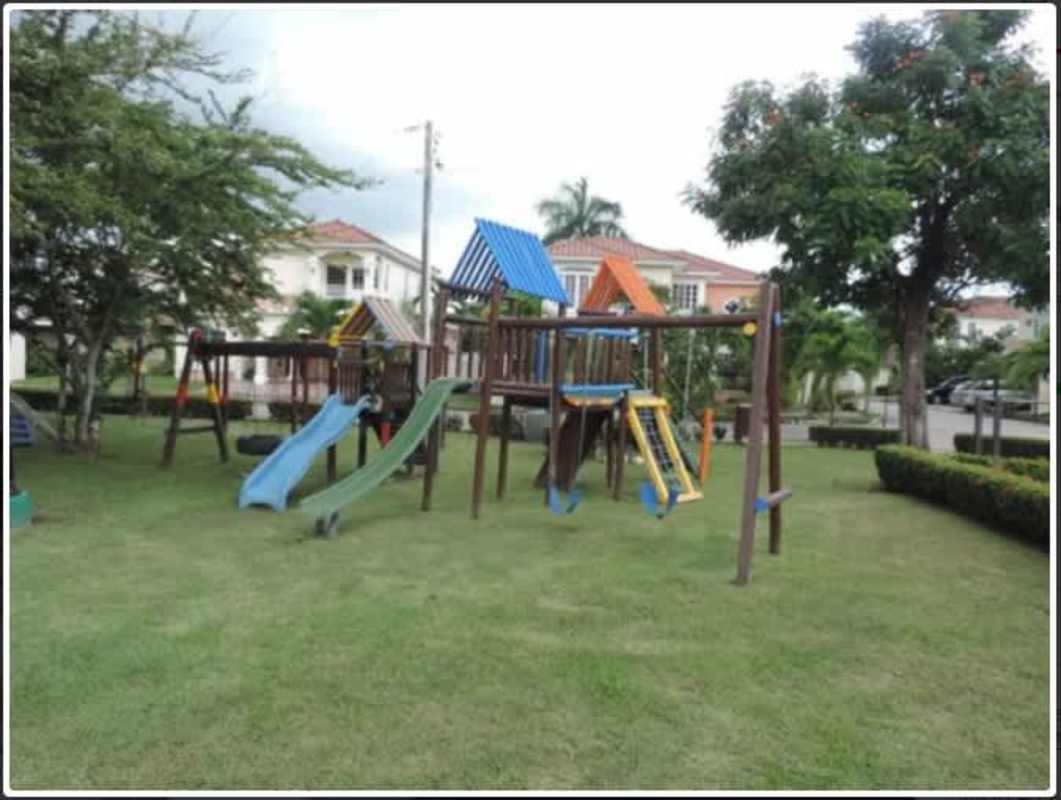 Children’s playground and garden area inside Villa Valencia Costa Sur Panama