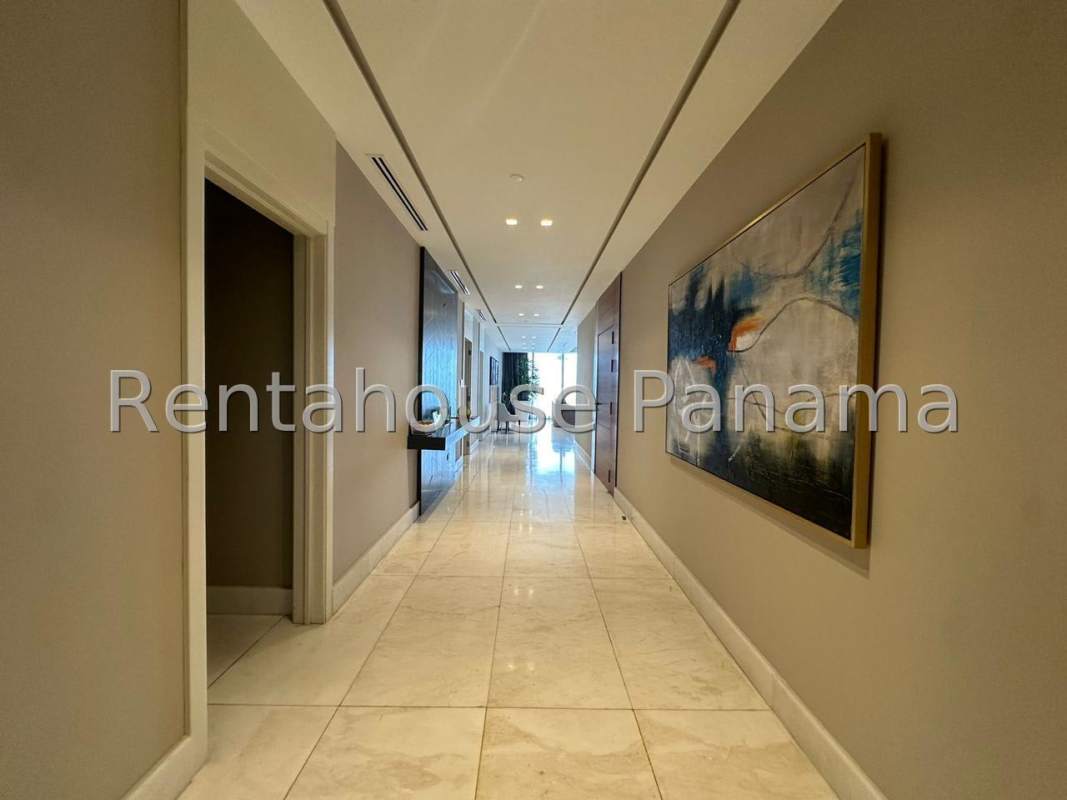 Luxury bathroom with dual vanities, marble finishes, glass-enclosed shower in PH The Residences Punta Pacífica