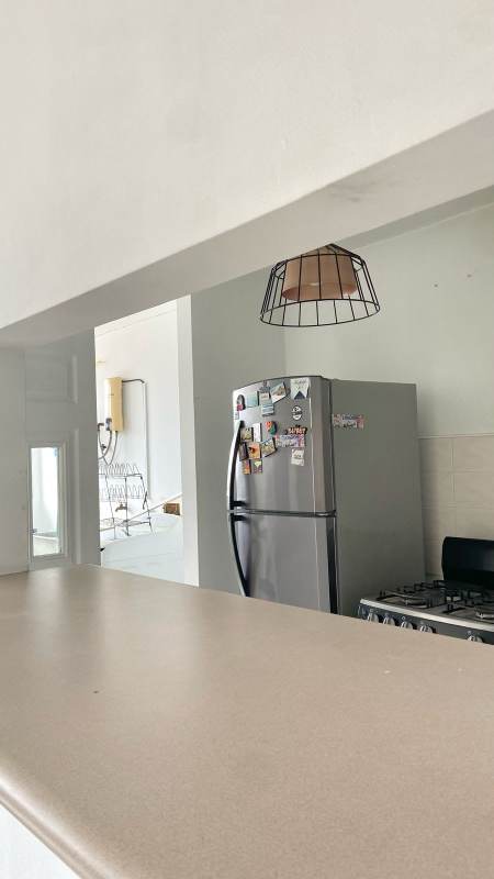 Dining area with modern lighting and furnishings in PH Park Place Panama City