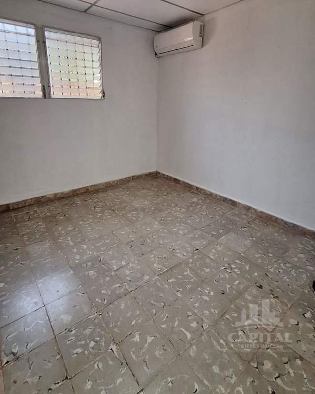 Gated entry with tiled stairs, peach walls, and secure fences Don Bosco Panama