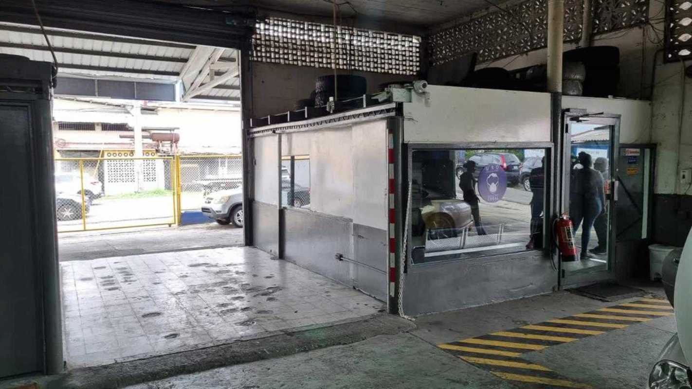 Industrial interior with enclosed office cabin and storage space in warehouse Panama