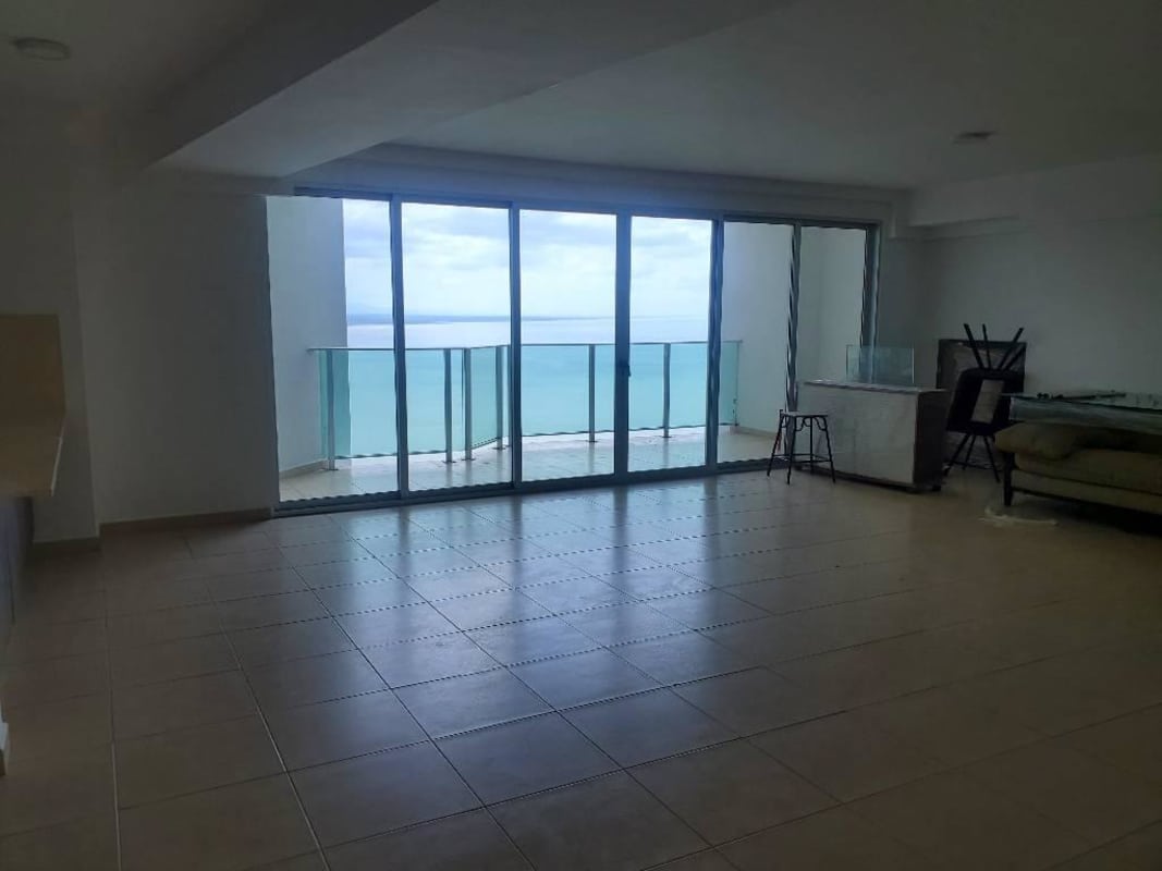 Open kitchen with granite countertop and built-in cabinets in luxury apartment Oasis on the Bay Punta Pacifica Panama