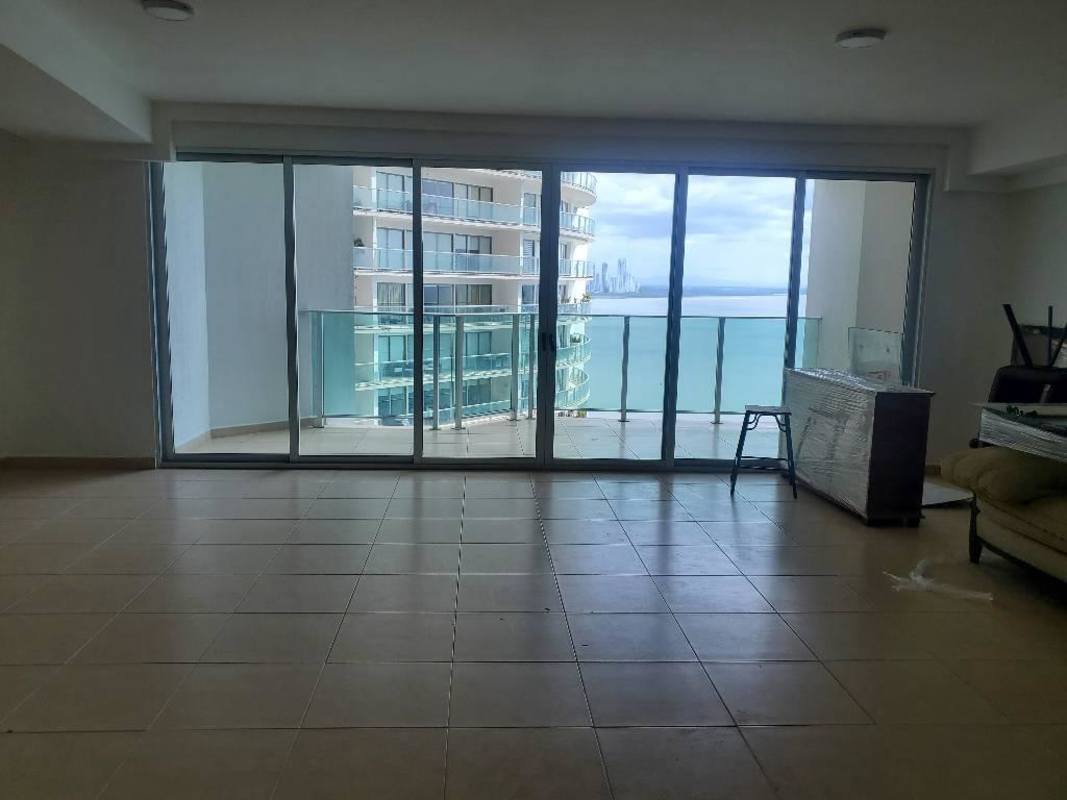 Oceanfront infinity-edge swimming pool with city and sea views at Oasis on the Bay Punta Pacifica Panama