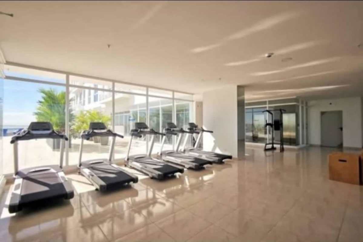 Bright neutral hallway connecting rooms at PH The Sands Panama City