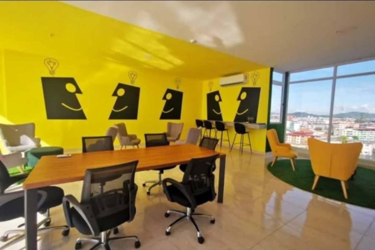 Spacious living room with full ocean view floor-to-ceiling windows PH The Sands