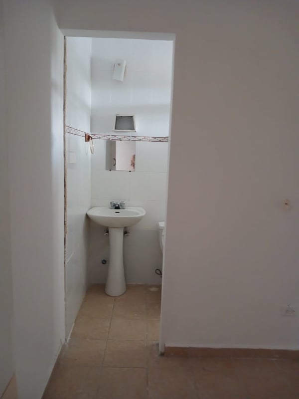 Contemporary kitchen with granite countertops, refrigerator and breakfast nook in Costa del Este house for rent