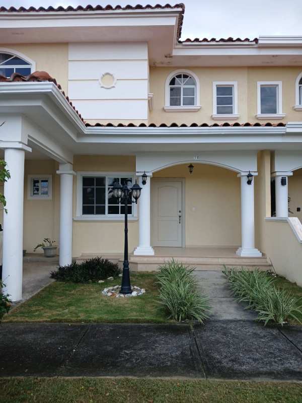 Modern bathroom with glass-enclosed shower and vanity in Costa del Este rental house Panama