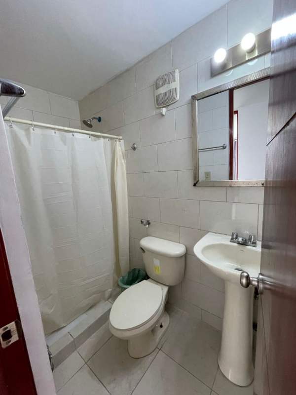 Main bedroom with split AC, closet, tile floors PH Central Park Panama