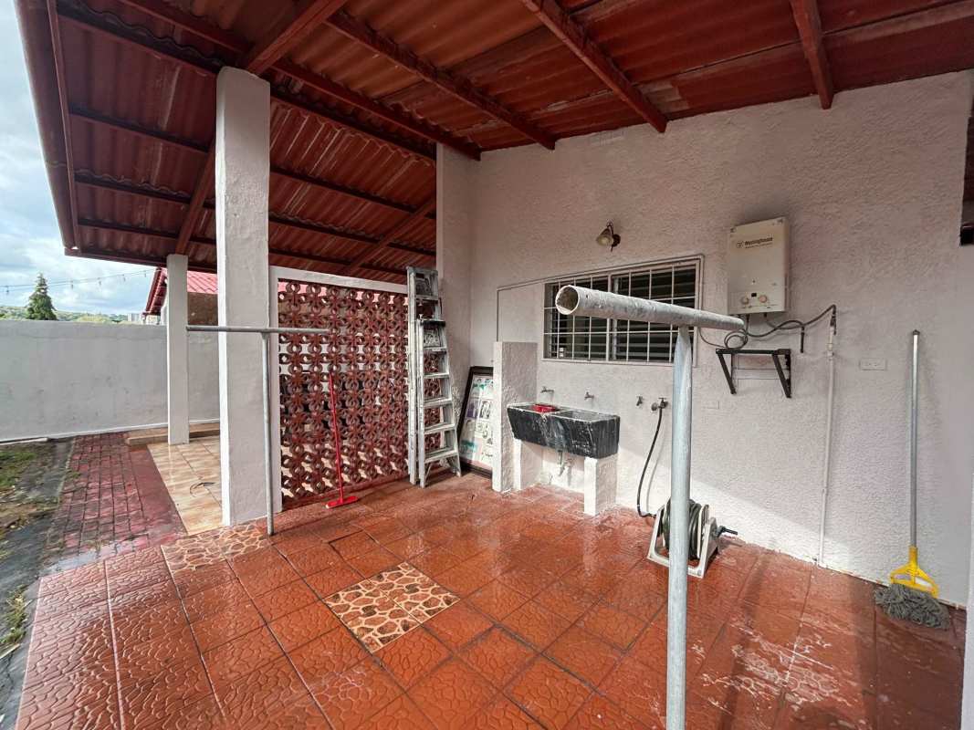 Bedroom interiors with ceiling fans, tiled floor and large closets in Brisas del Golf rental house