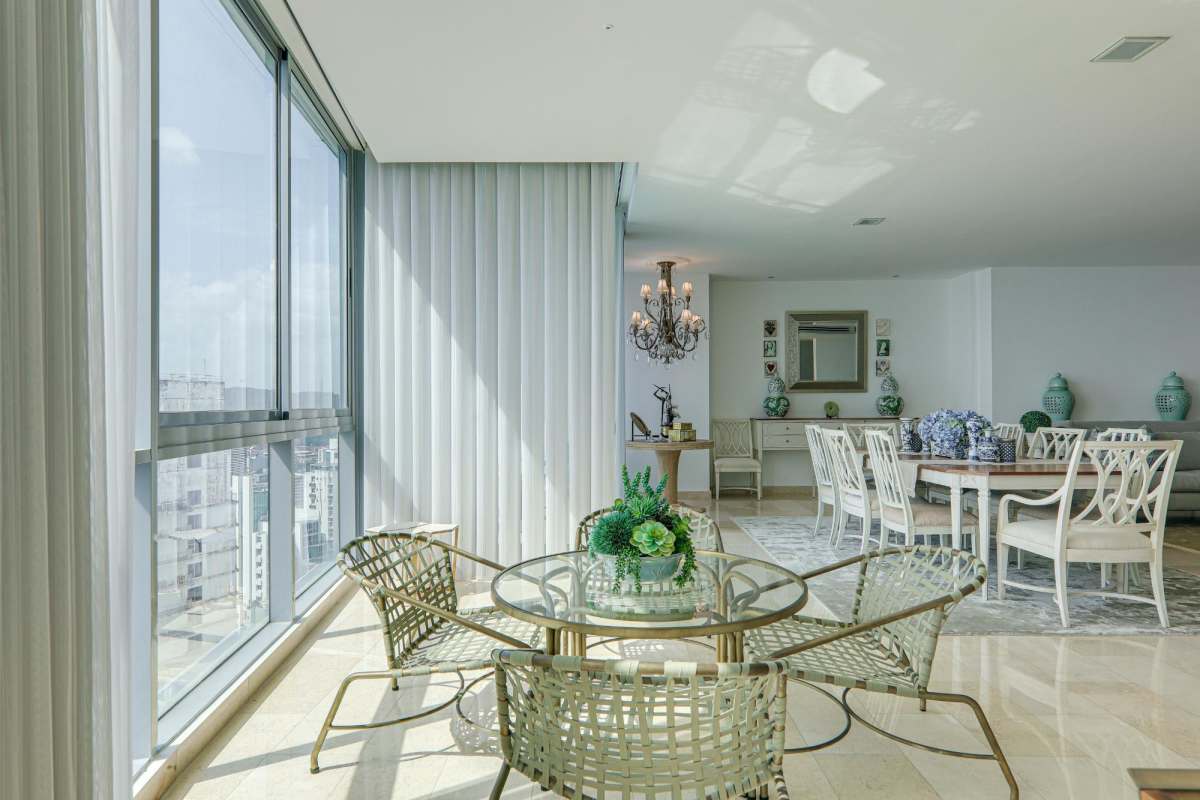 Spacious bedroom suite with panoramic ocean canal and skyline views in Allure at the Park penthouse