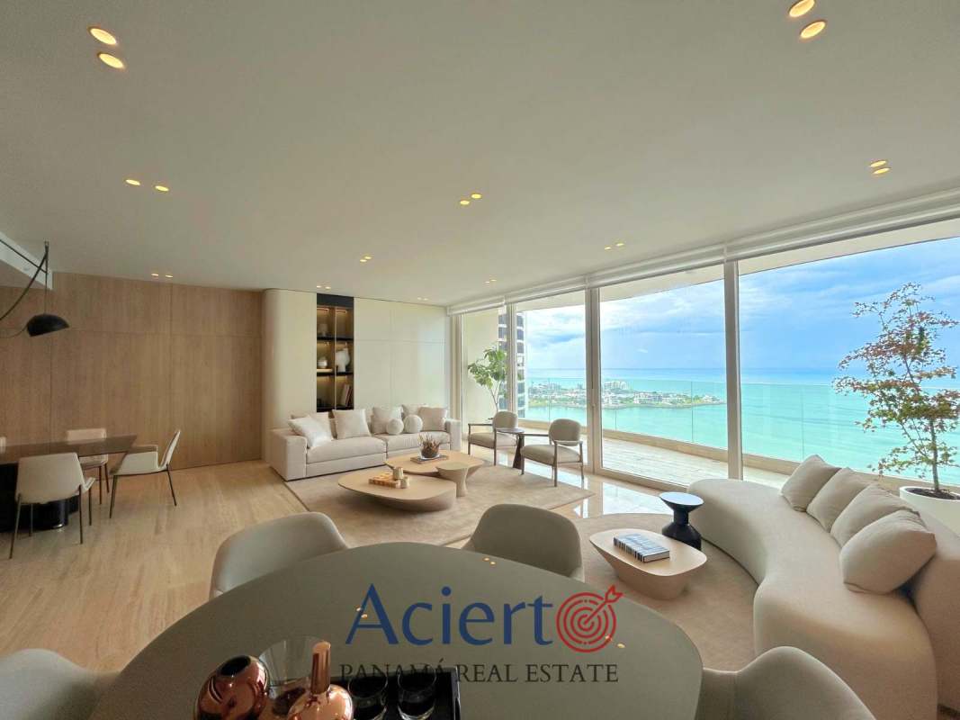 Master suite with ocean view windows, luxury decor and ensuite bath in PH Punta Paitilla Panama City