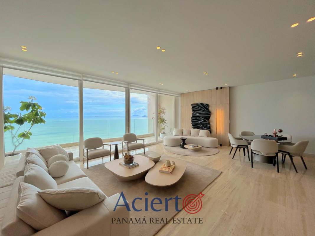 Contemporary kitchen with premium finishes, quartz countertops, island with seating in Punta Paitilla condo