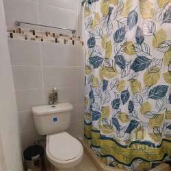 Bedroom with tile floor and built-in frosted glass closet Arboledas Panama