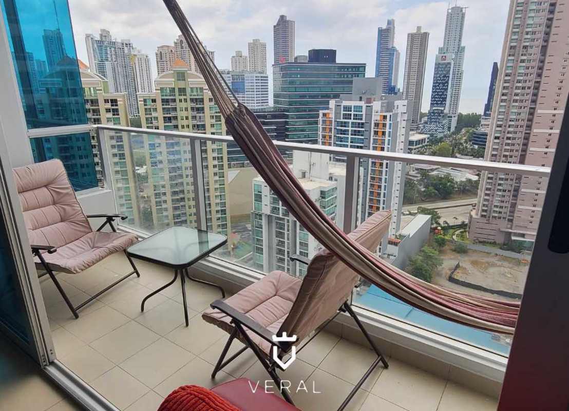 Master bedroom furnished with balcony access and skyline panorama in PH Top Tower Panama City