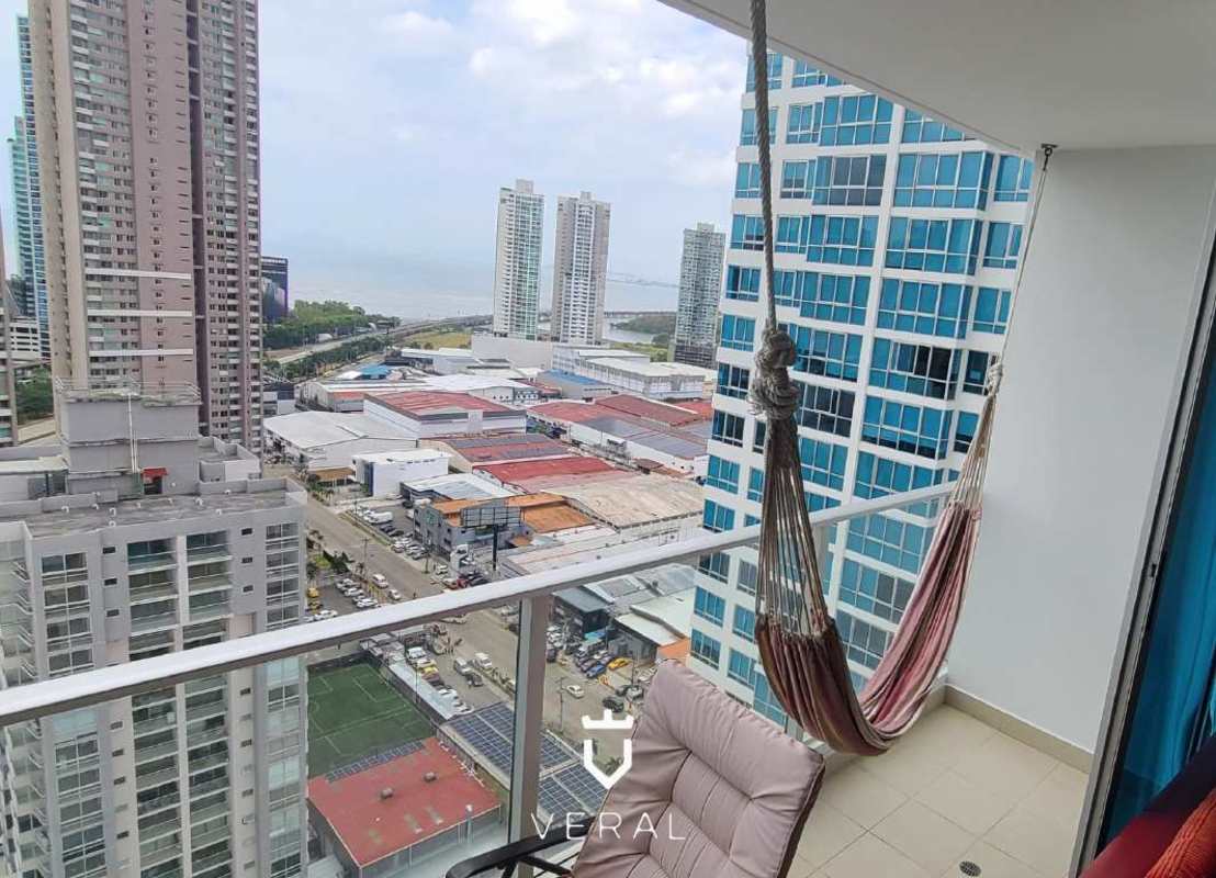 Open kitchen with granite countertops, breakfast bar and stainless appliances in PH Top Tower Panama
