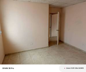 Bedroom with pink walls tiled floor open door family house rent Brisas del Golf Arraiján