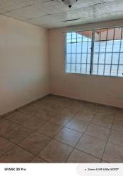 Empty bedroom with security window tiled floors rental house Brisas del Golf Arraiján Panama