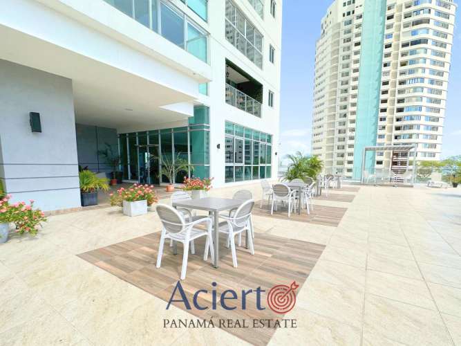 Modern tower facade with terrace and outdoor seating at Quartier Boutique Coco del Mar Panama