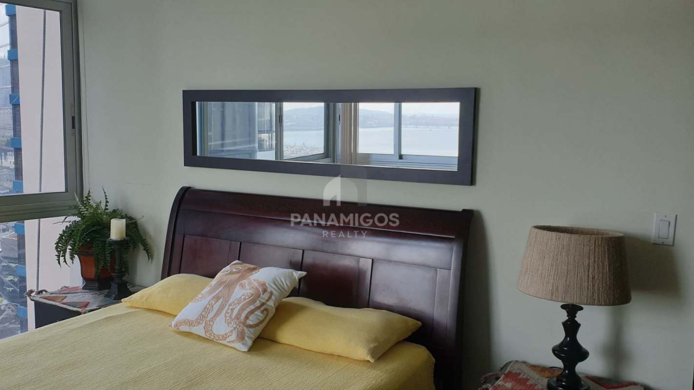 Bedroom with sea view window, modern decor in PH Bayfront Panama