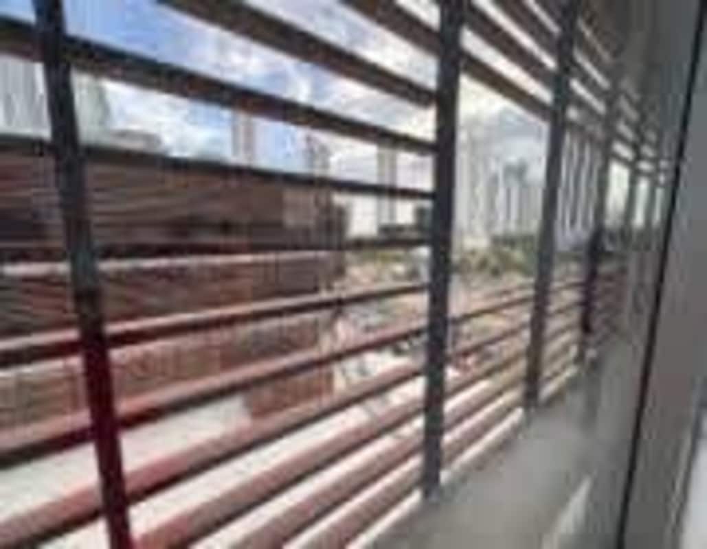 Interior of bright empty medical office space with window in Torre Arboleda Panama