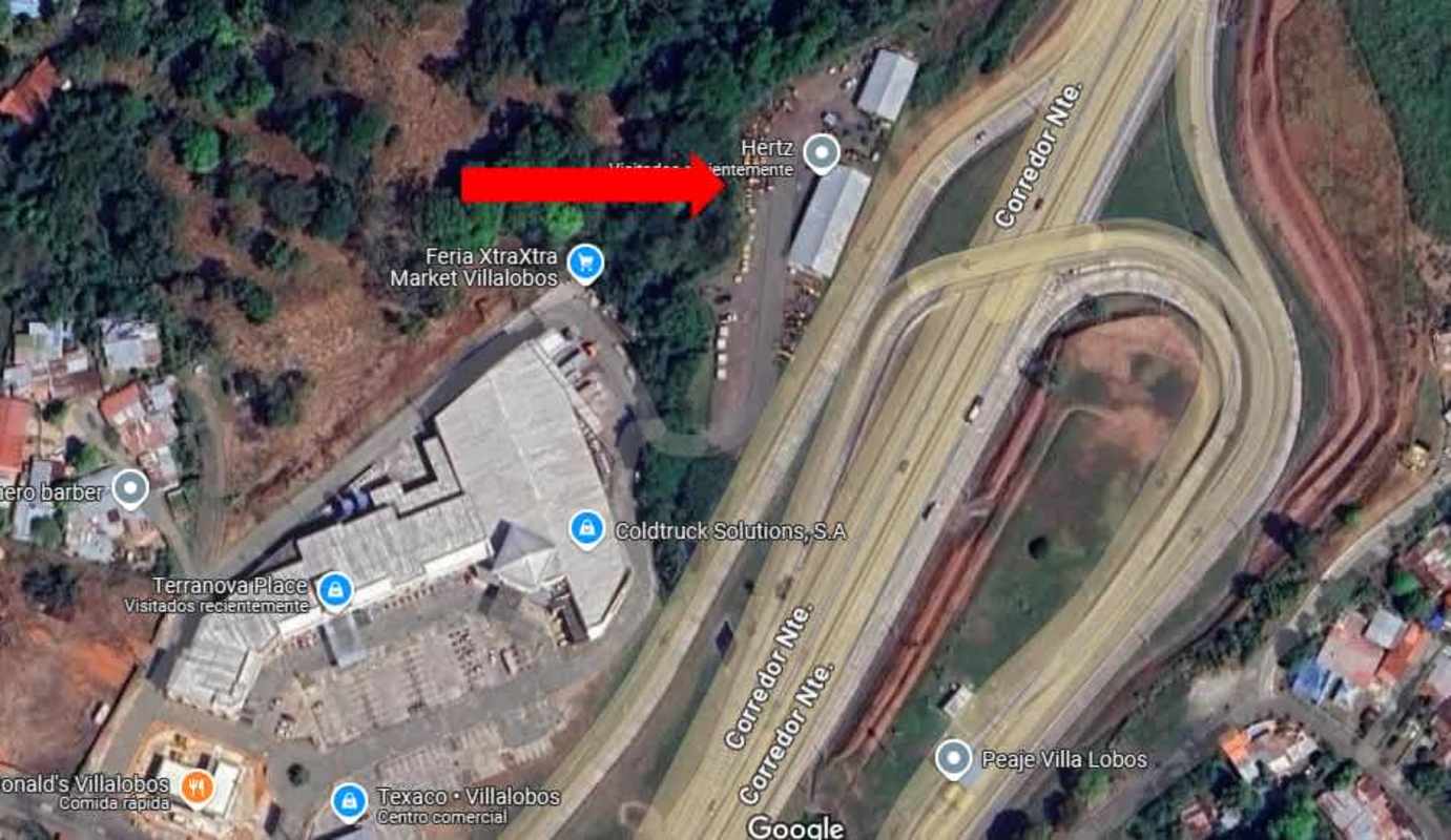 Commercial and industrial land with fence and warehouse adjacent to Corredor Norte highway Panama