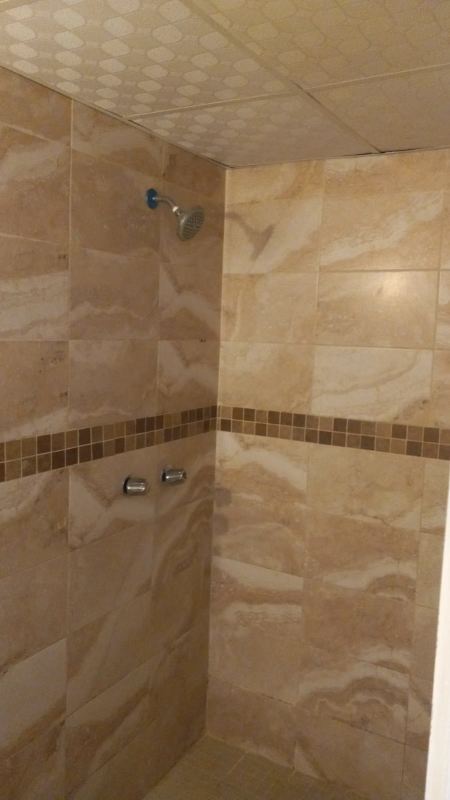 Open plan living and dining area with tiled floor in PH Las Palmeras Rio Abajo