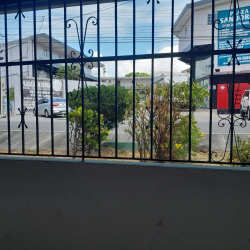 Street entrance with secure fencing Penonomé house downtown