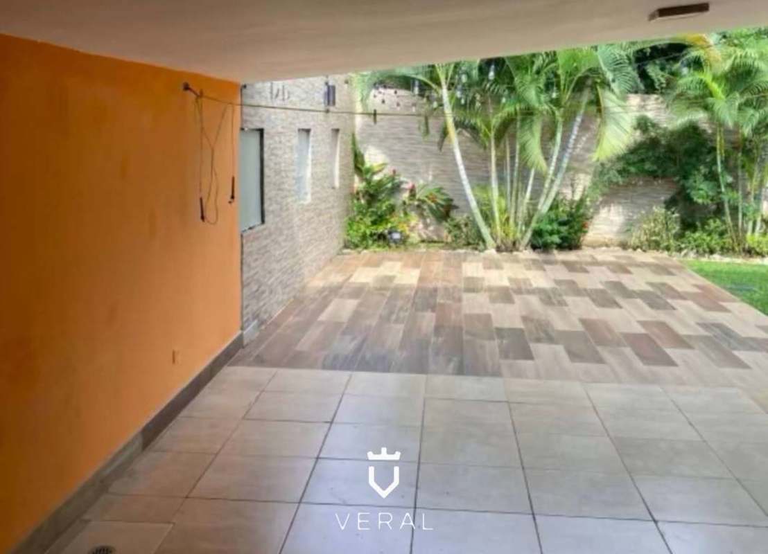 Covered patio tiled floor lush garden Versalles Costa Sur Panama