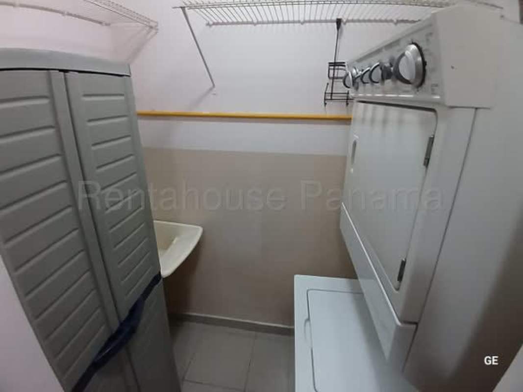 Bathroom with tiled walls and sink PH Parque Lefevre Panama