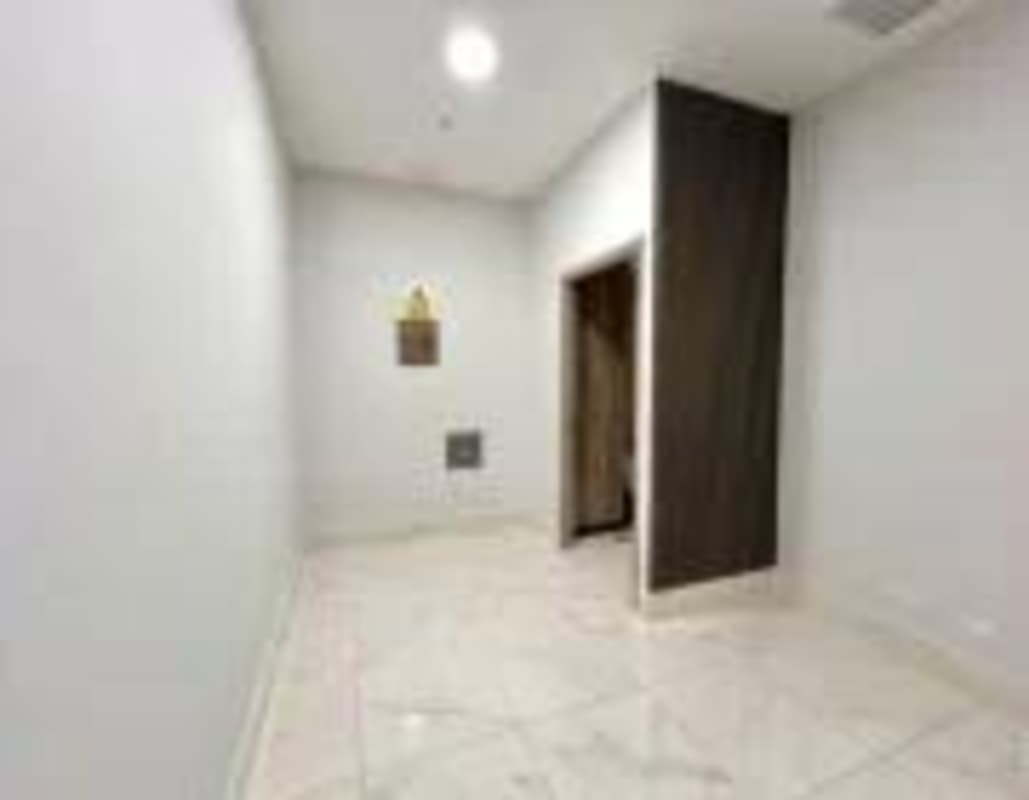 Reception space with accent wall and marble flooring medical suite PH Town Center