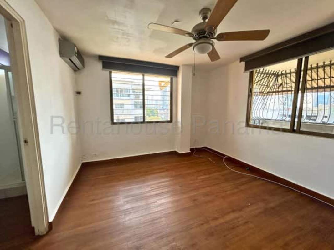 Bathroom with glass shower, vanity and large mirror condominium Panama