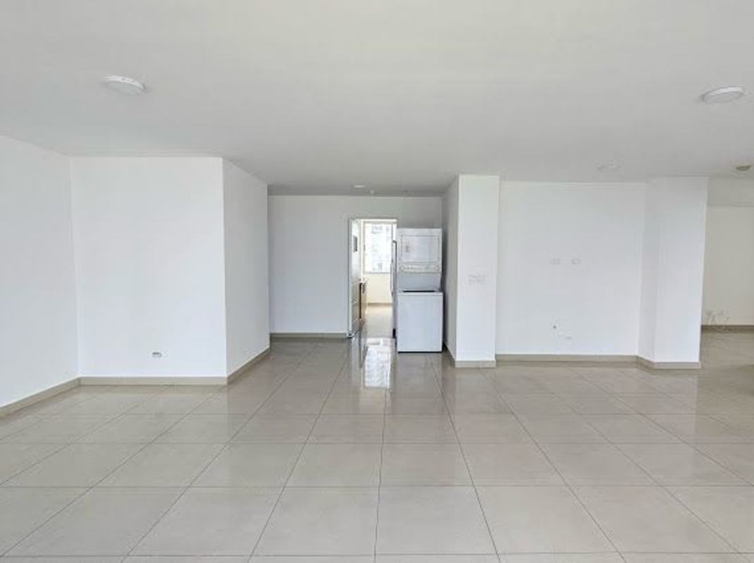 Kitchen with granite counters, appliances, white cabinets Costa del Este Tower