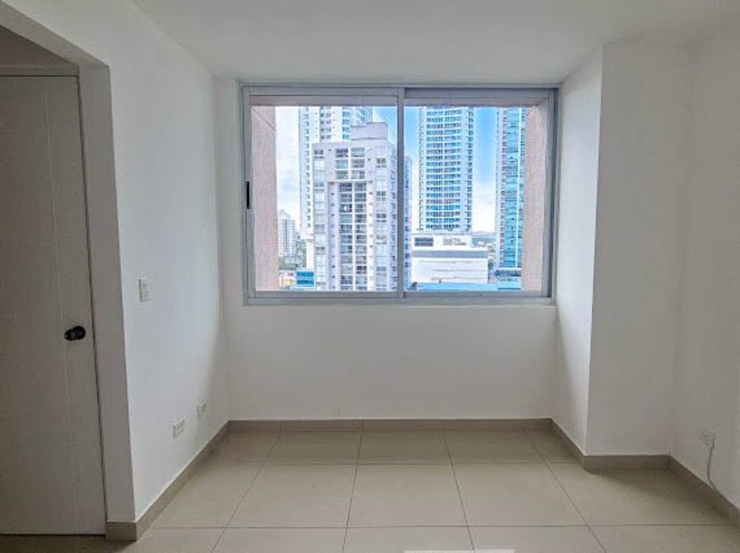 Bedroom with closet and city views in luxury tower Costa del Este Panama