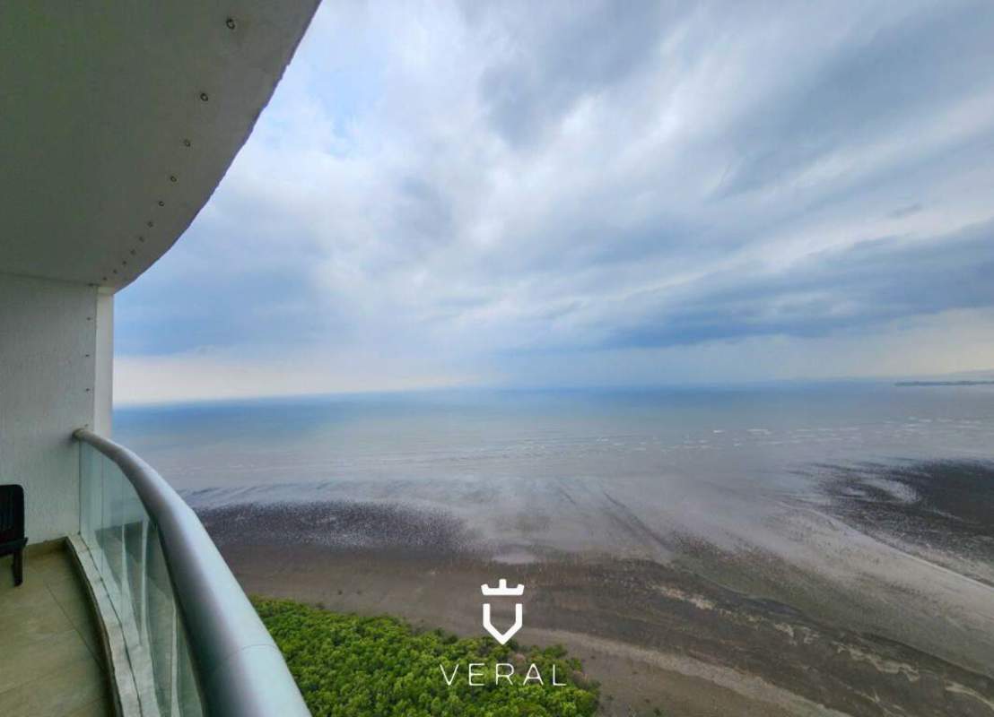 Spacious kitchen with granite countertops and stainless steel appliances in PH Pearl At The Sea Panama