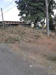 Cleared flat residential lot for sale with utility poles in Barrio Colón Capira Panama