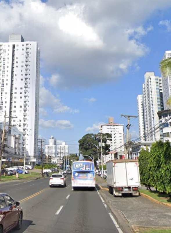 High-rise apartment towers, traffic, greenery urban Carrasquilla neighborhood Panama City