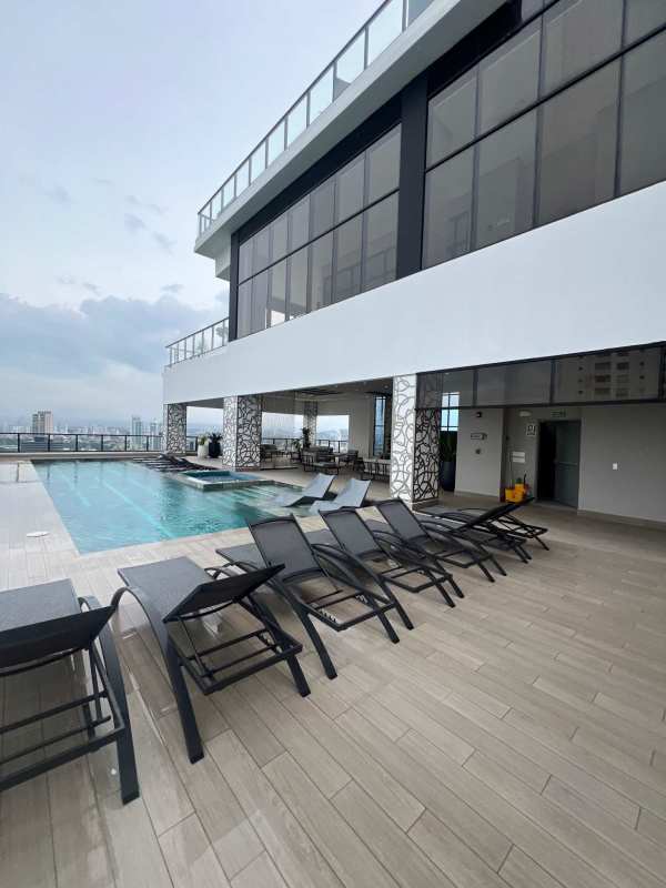 Rooftop infinity pool overlooking skyline at PH Arcadia Costa del Este Panama