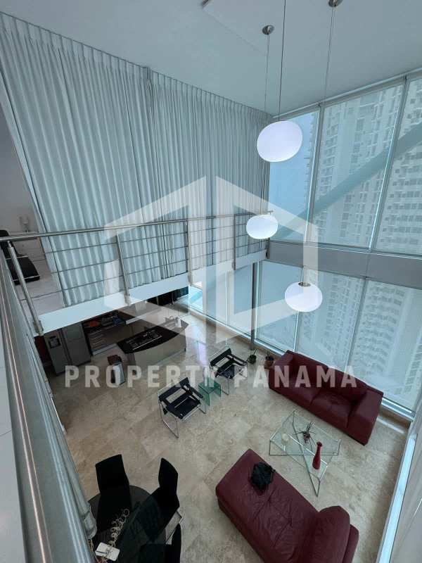 Contemporary bathroom with marble tiles and glass shower enclosure in PH Loft 41 Panama City