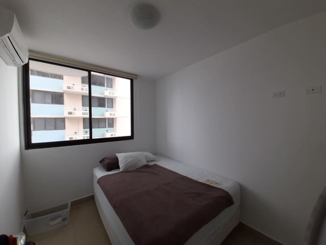 Bedroom with AC, large window, neutral decor in PH San Francisco Bay Tower 500 Panama City