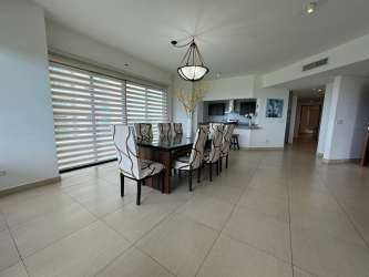 Spacious living room with terrace access ocean golf views luxury Panama property