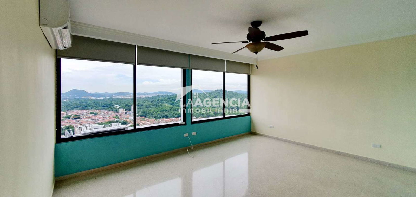Large closed kitchen with granite countertops, wood cabinetry and natural light in apartment for rent PH Pacific Hills Dos Mares Panama