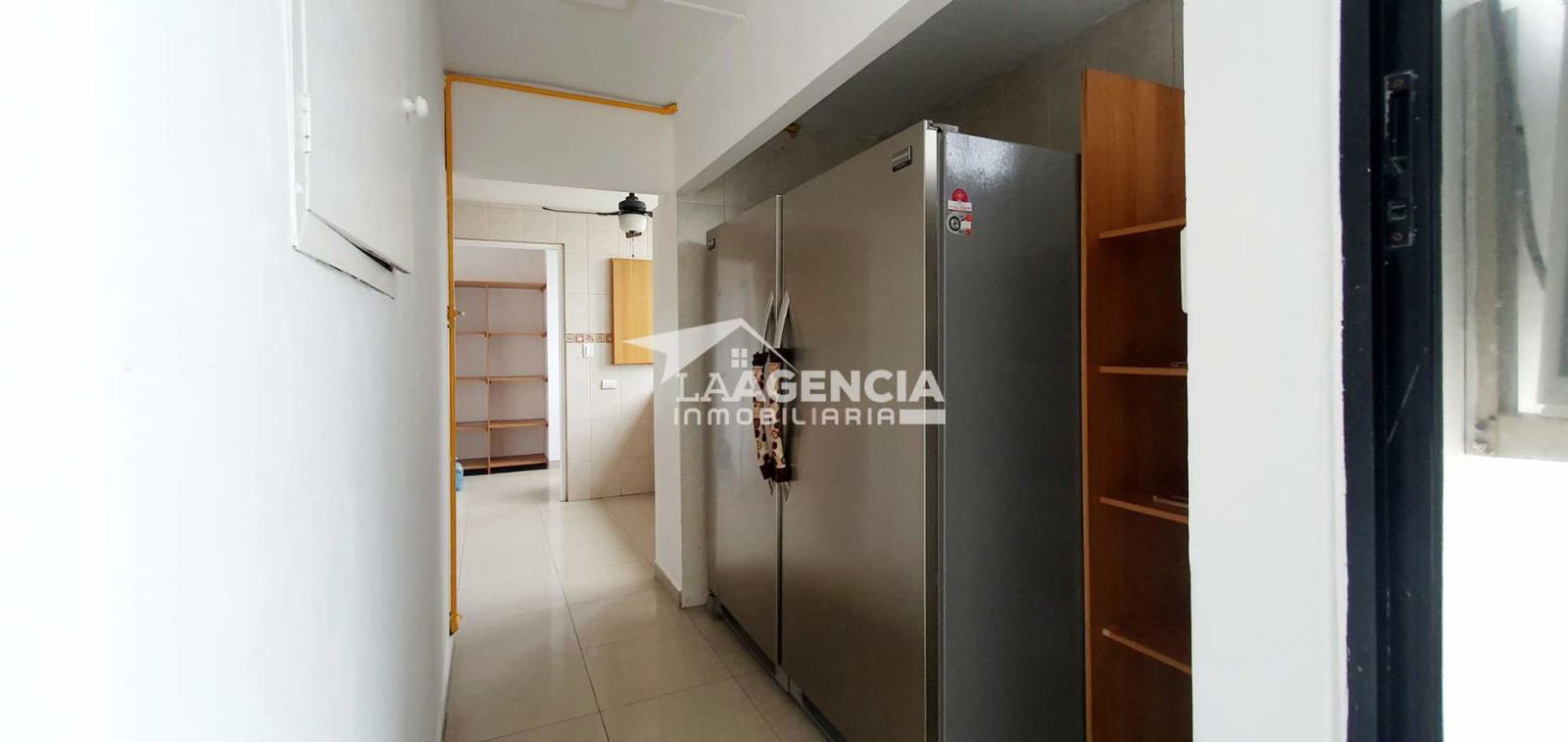 Contemporary bathroom with granite countertop and glass shower enclosure in luxury PH Pacific Hills apartment Panama City