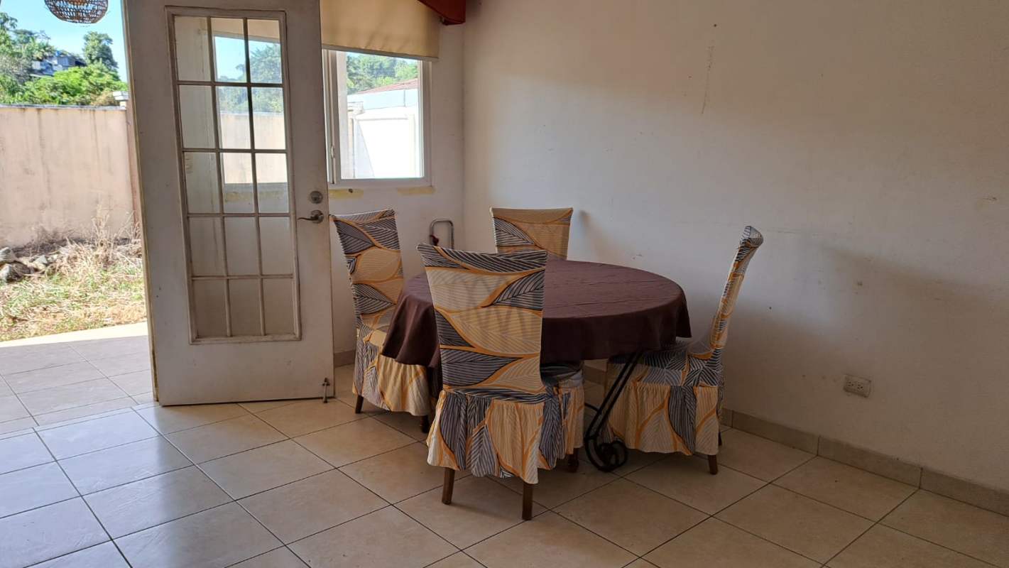 Spacious kitchen with granite countertops, stainless appliances, and window in PH Vista del Valle Villa Lucre Panama