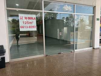 Glass entrance of empty 125 square meter retail commercial space for sale Plaza Vista Alegre Arraiján Panama