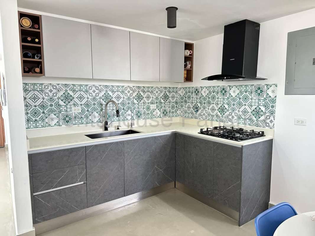 Remodeled kitchen granite countertop decorative tile backsplash PH Worldwide Plaza Obarrio Panama